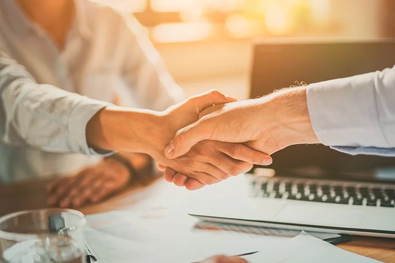 Business meeting shaking hands
